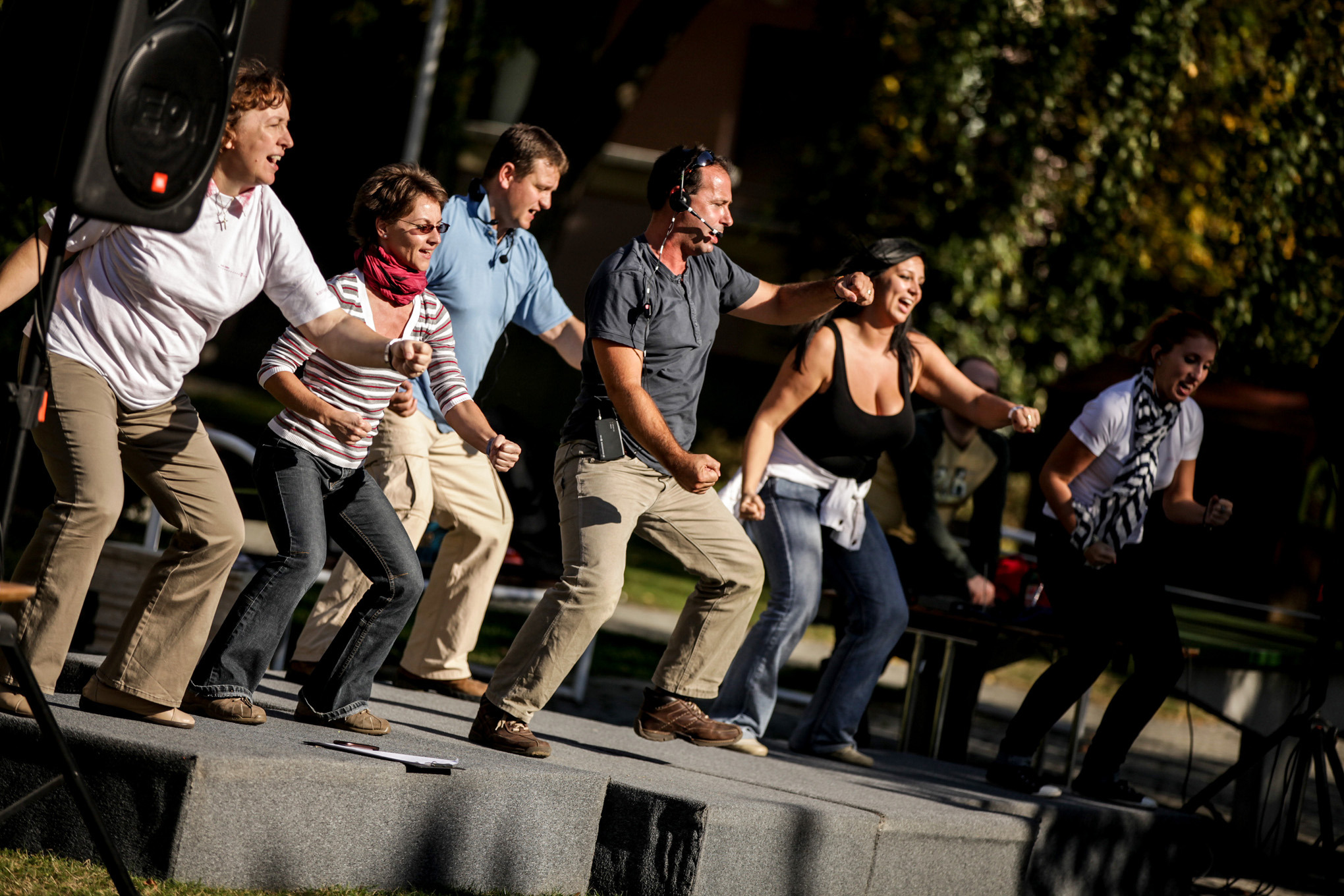 A group taking part together in an embodied development exercise