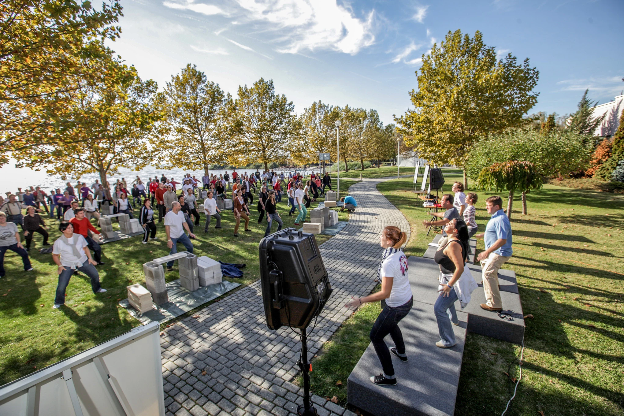 A large group moving together during an outdoor experiential programme