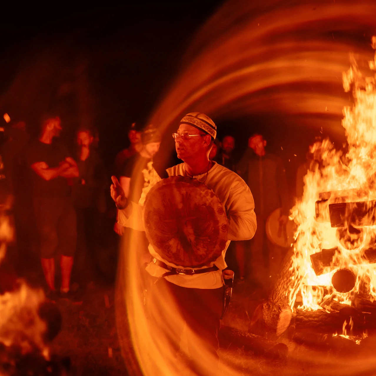 Tarr Bence László teaching beside the ceremonial fire