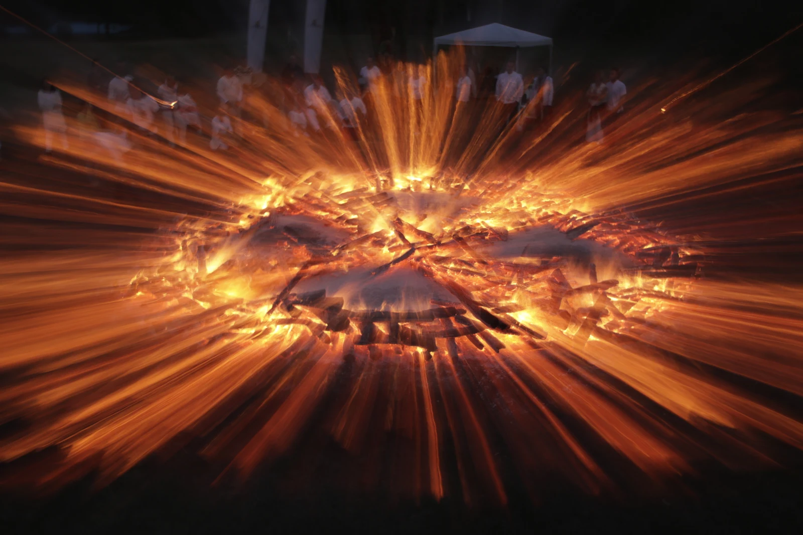 A circular firewalk glowing during a Four Seasons retreat